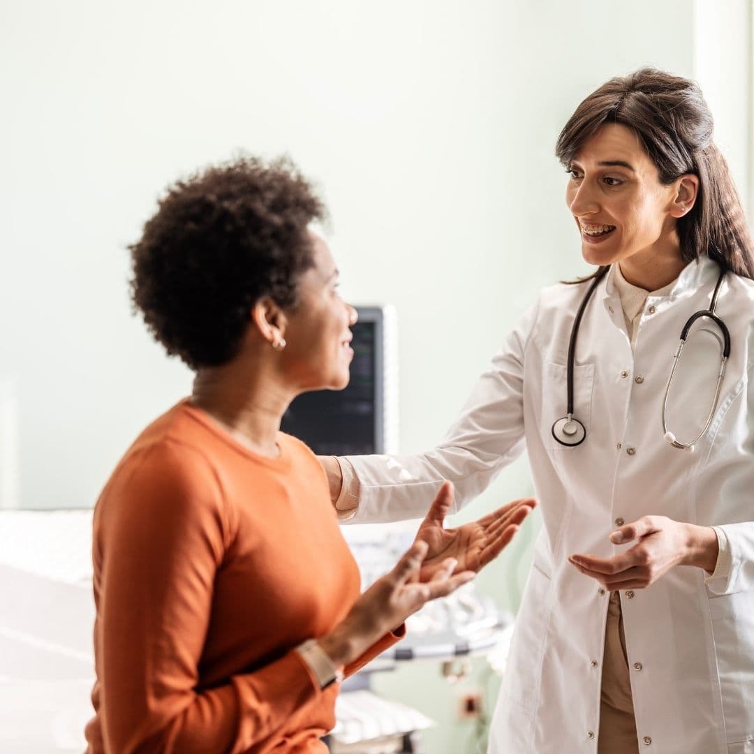 A physician talking with a patient