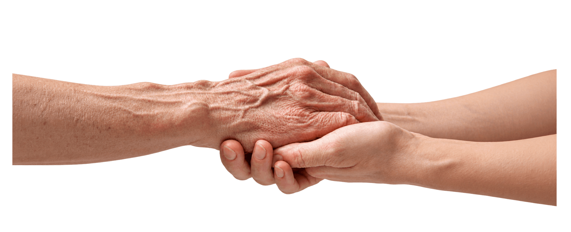 A younger person gently holding an older person’s hand